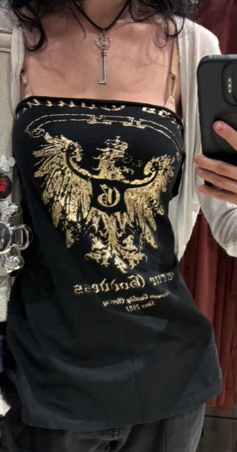 Mirror selfie of tube top.