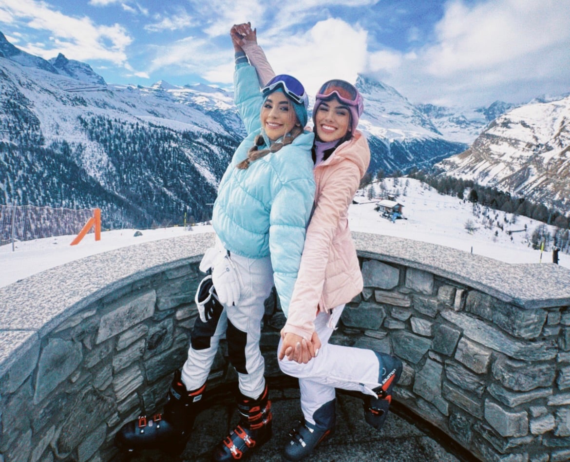 Girls skiing in the Swiss Alps