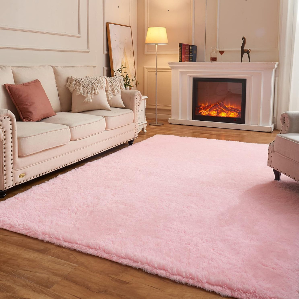 pink fluffy area rug in a living room