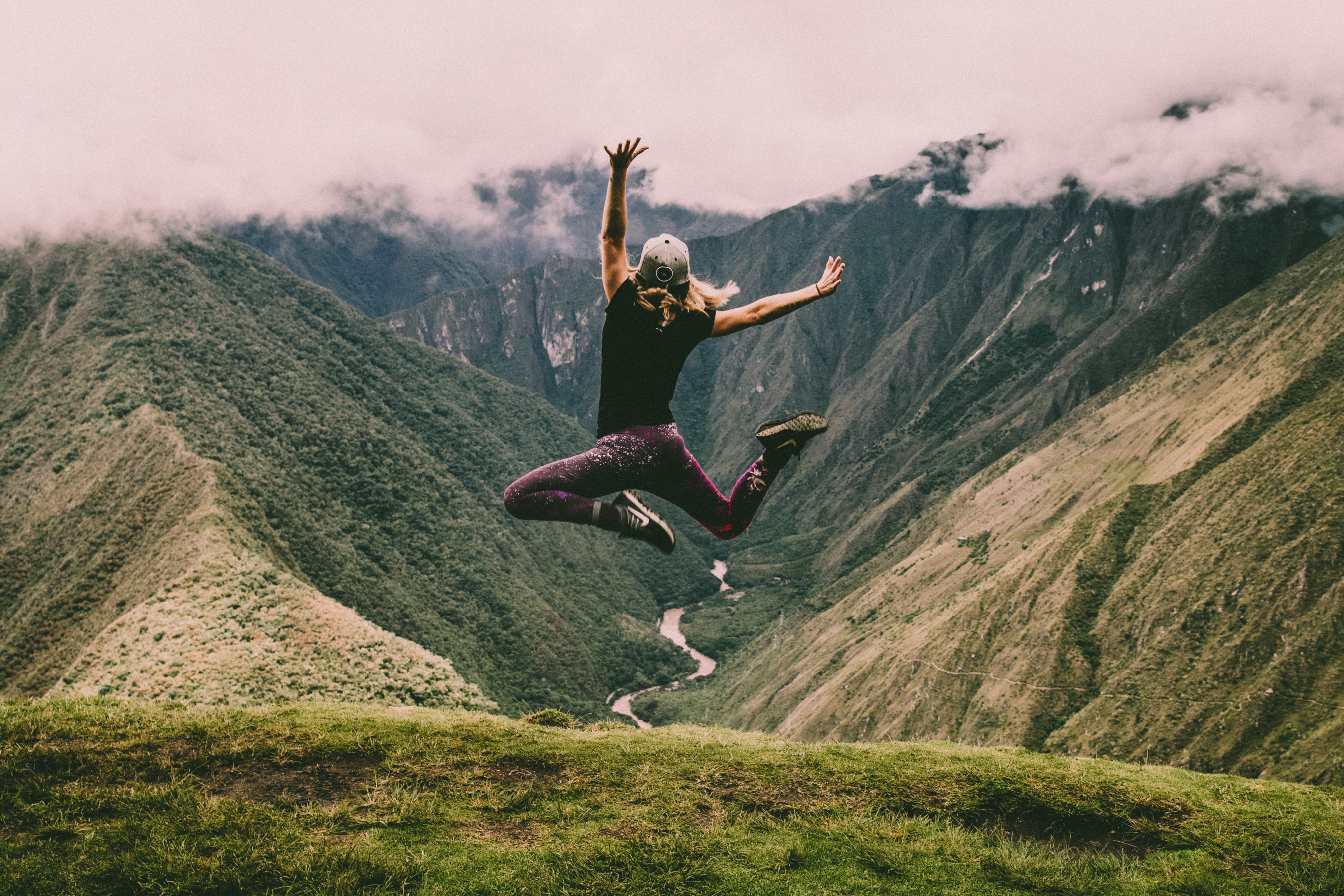 woman jumping in nature