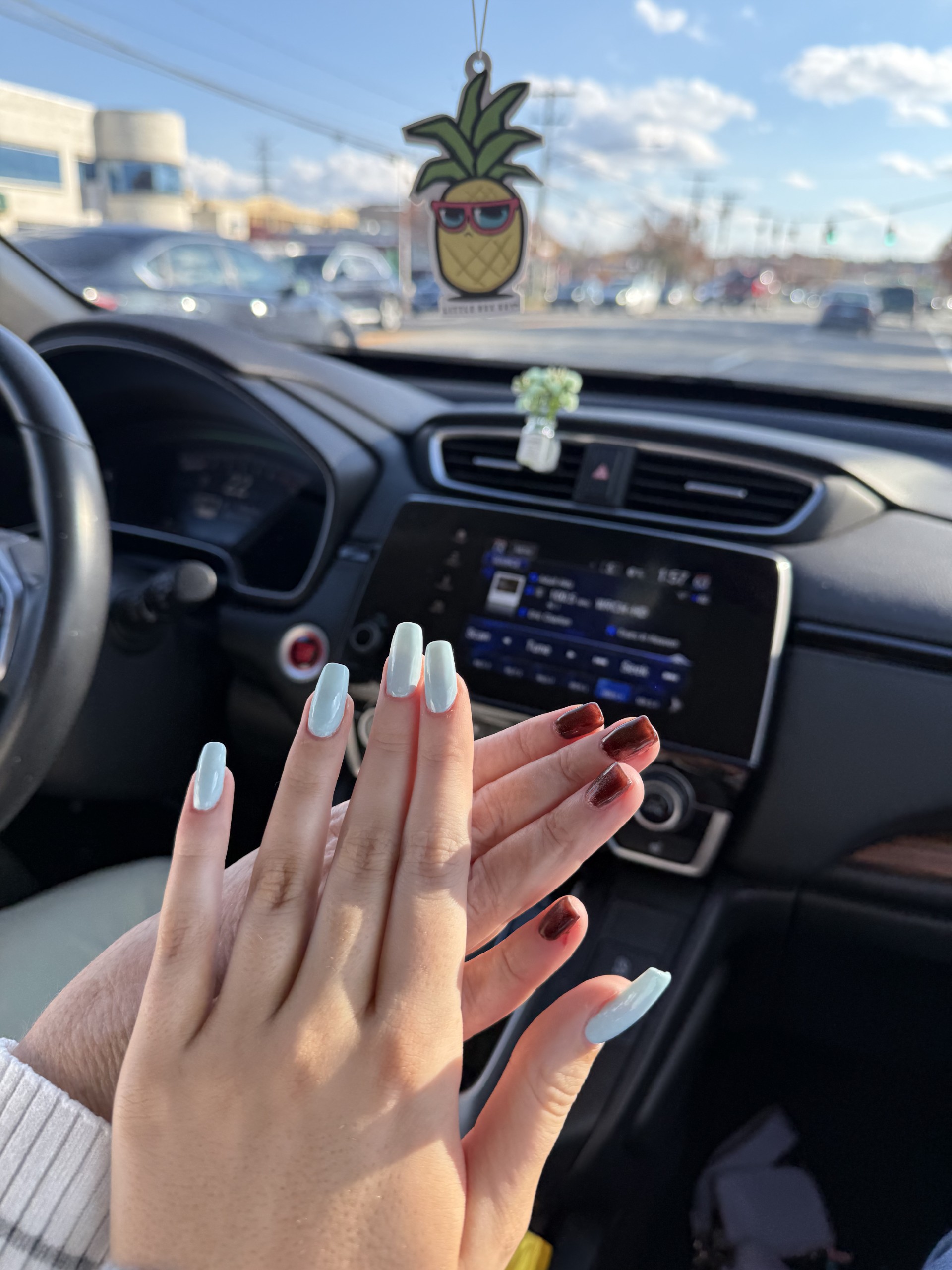 Mom and daughter with painted nails.