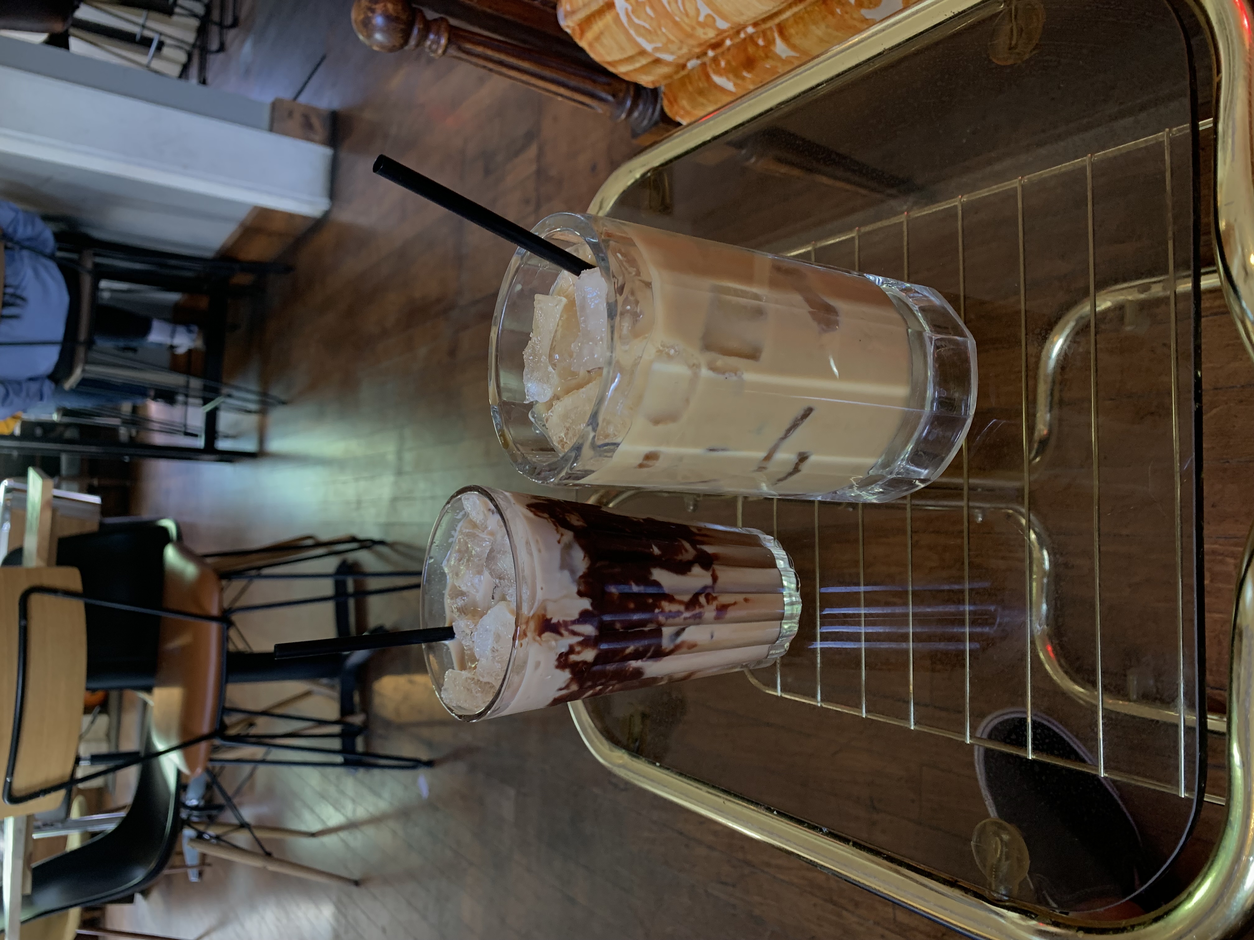 Photo of two iced coffees on a table
