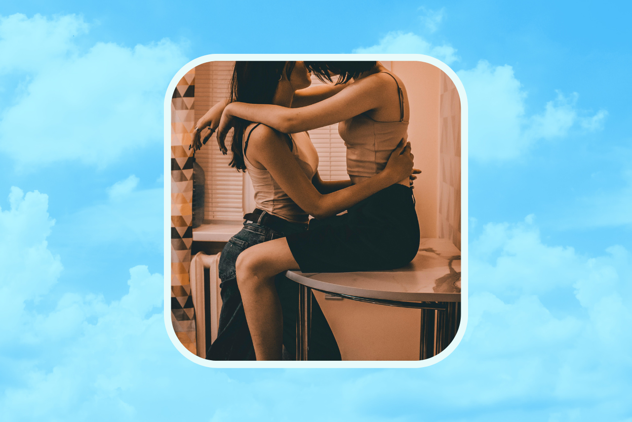 Couple kissing on a counter.