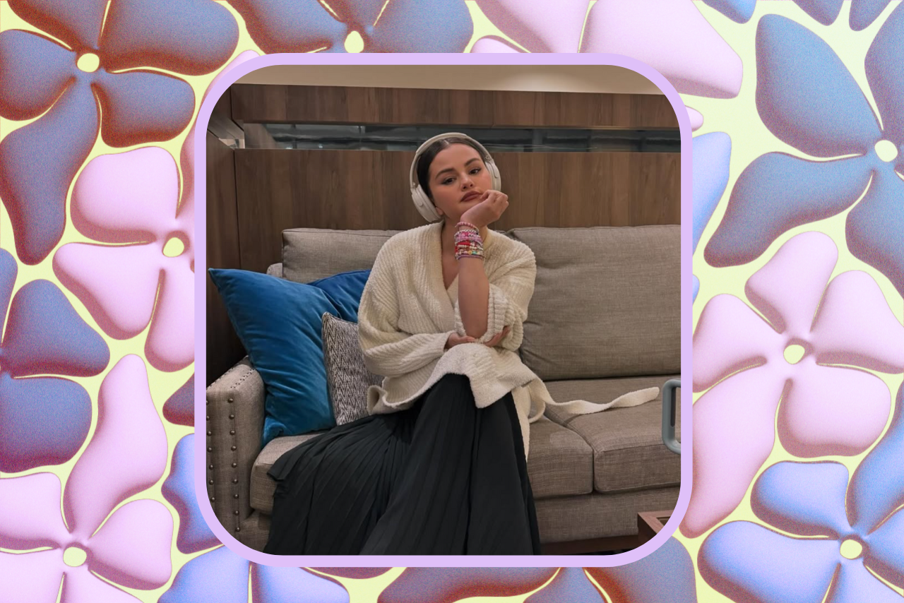 Selena Gomez sitting with headphones on.