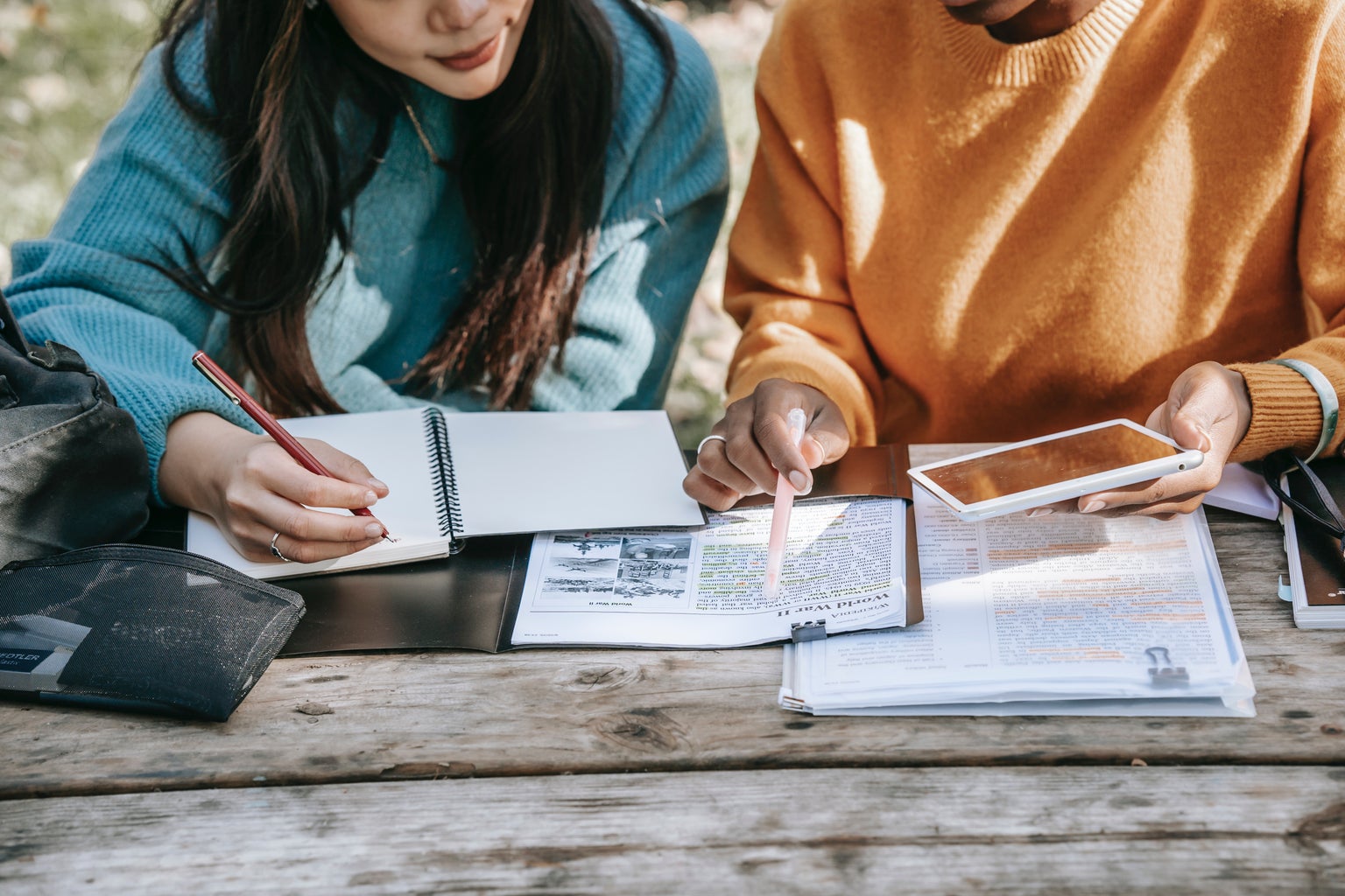 students studying together outside