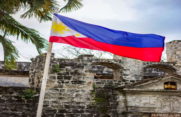 Filipino flag waving in the sky