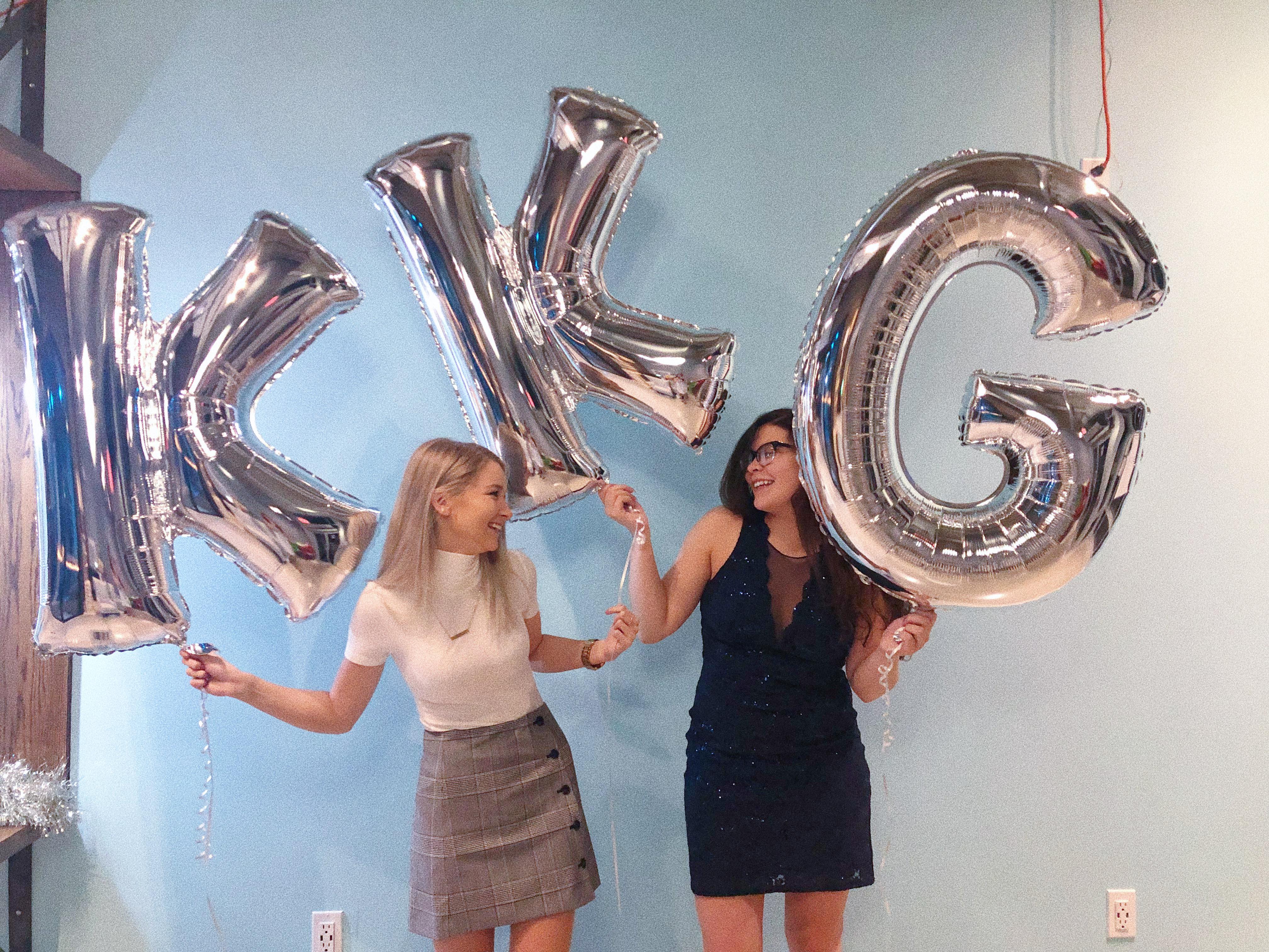 sorority sisters holding silver KKG balloons by Erin Coughenour?width=698&height=466&fit=crop&auto=webp&dpr=4