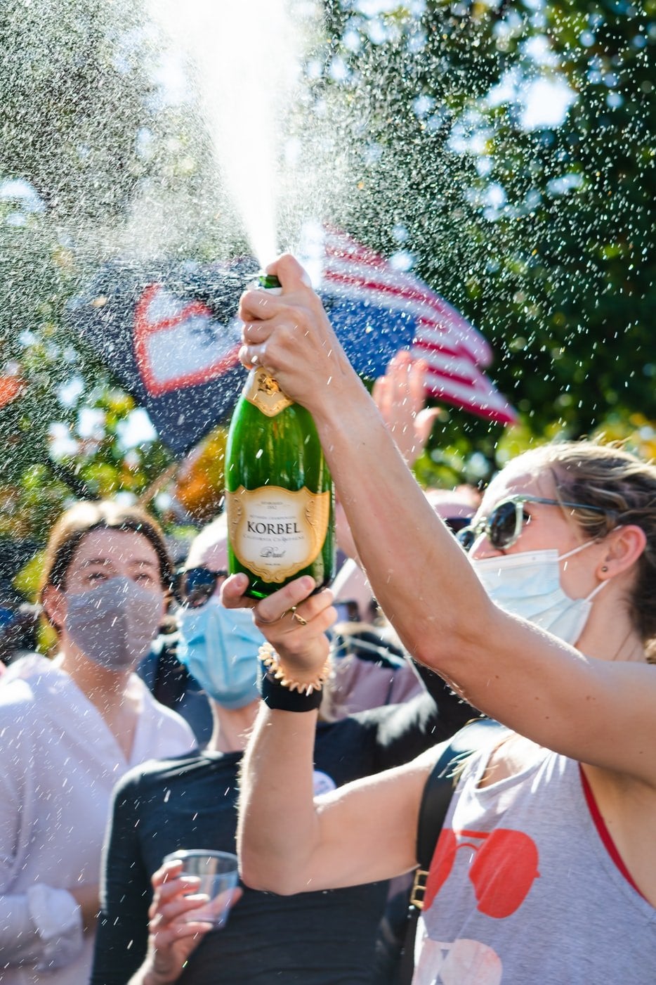 People holding champagne during day time