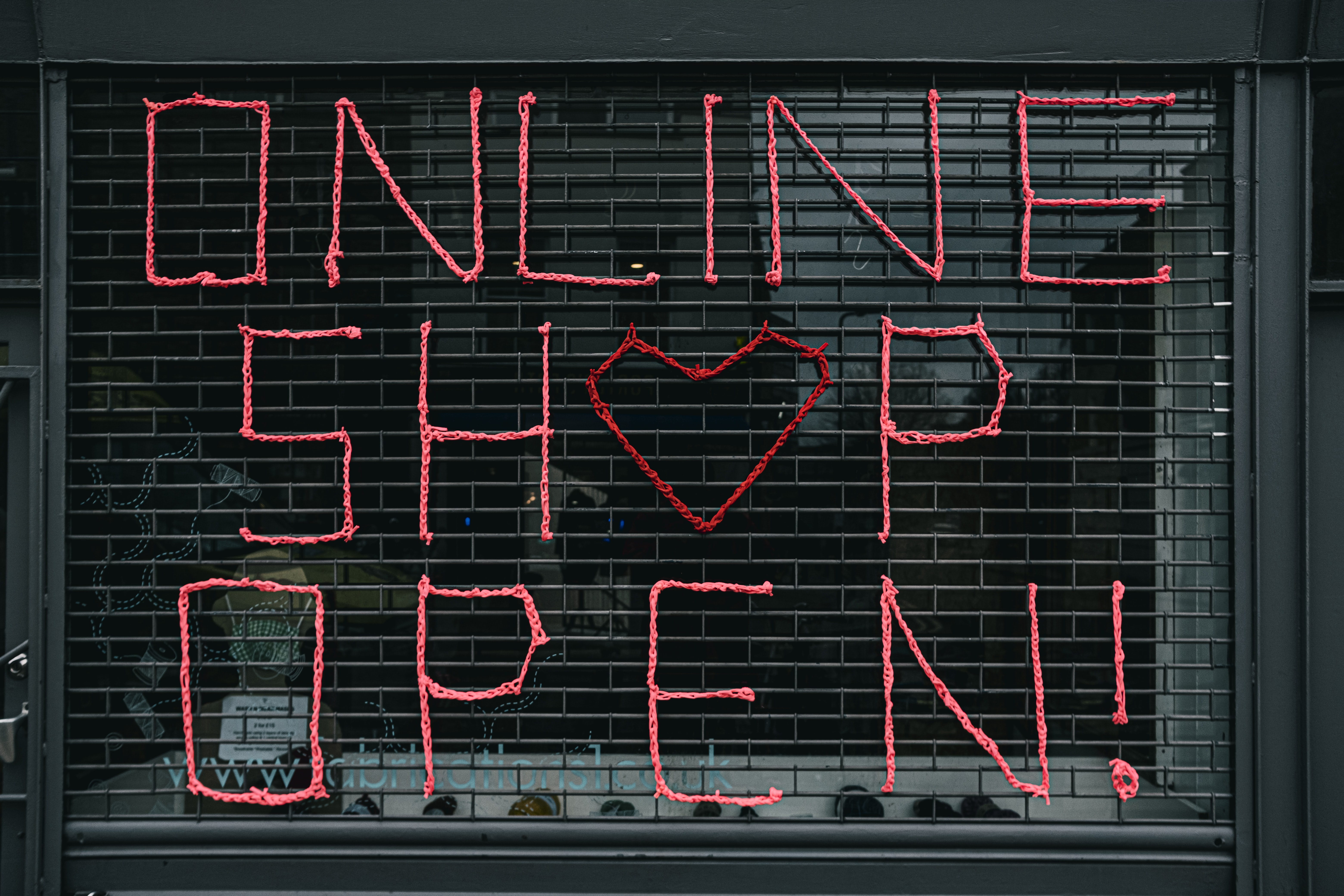 Red Font \"Online Shop Open\" on door