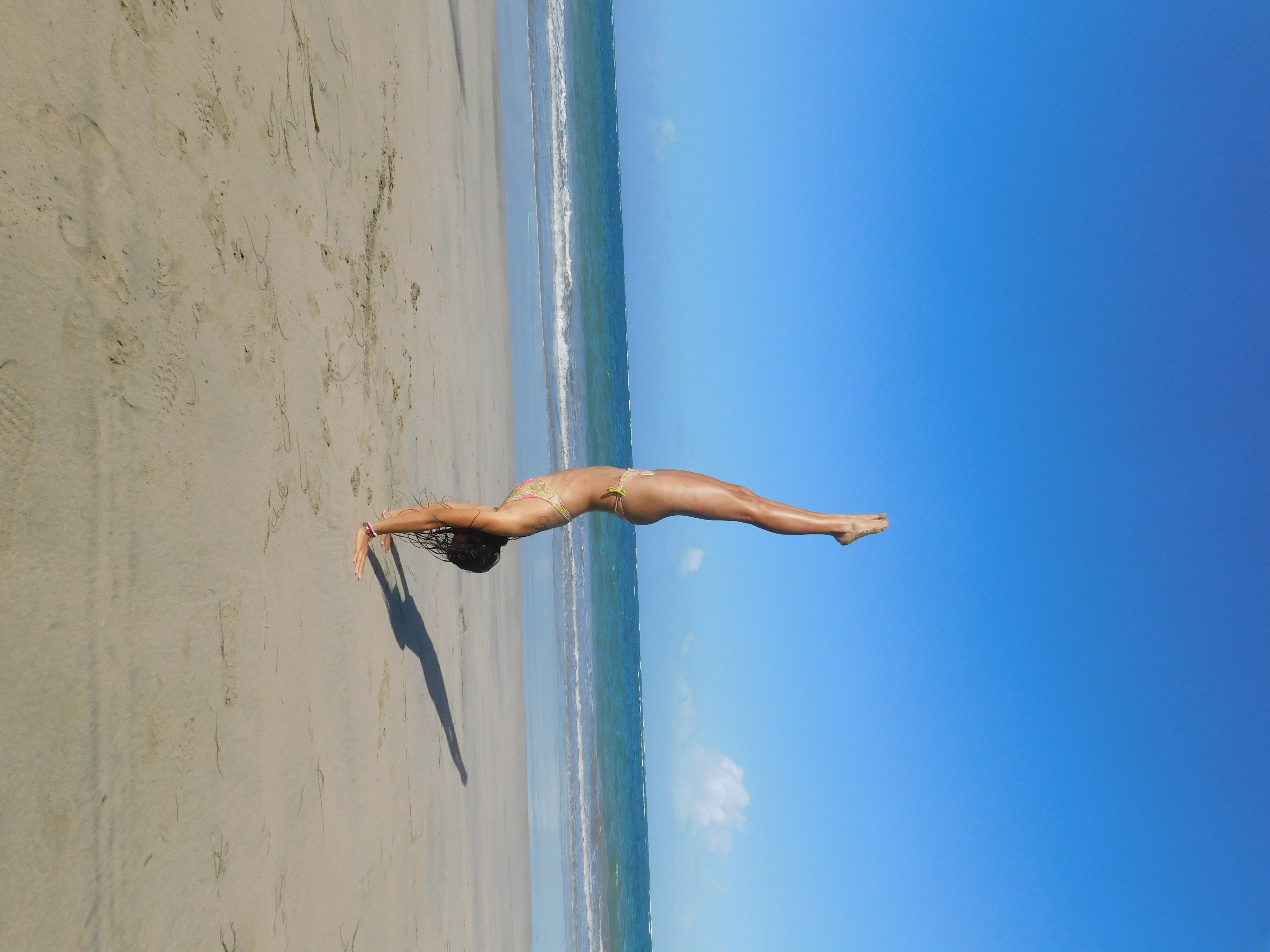 girl doing handstand