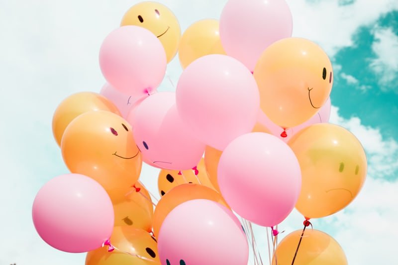 balloons with smiley faces by Unsplash?width=698&height=466&fit=crop&auto=webp&dpr=4