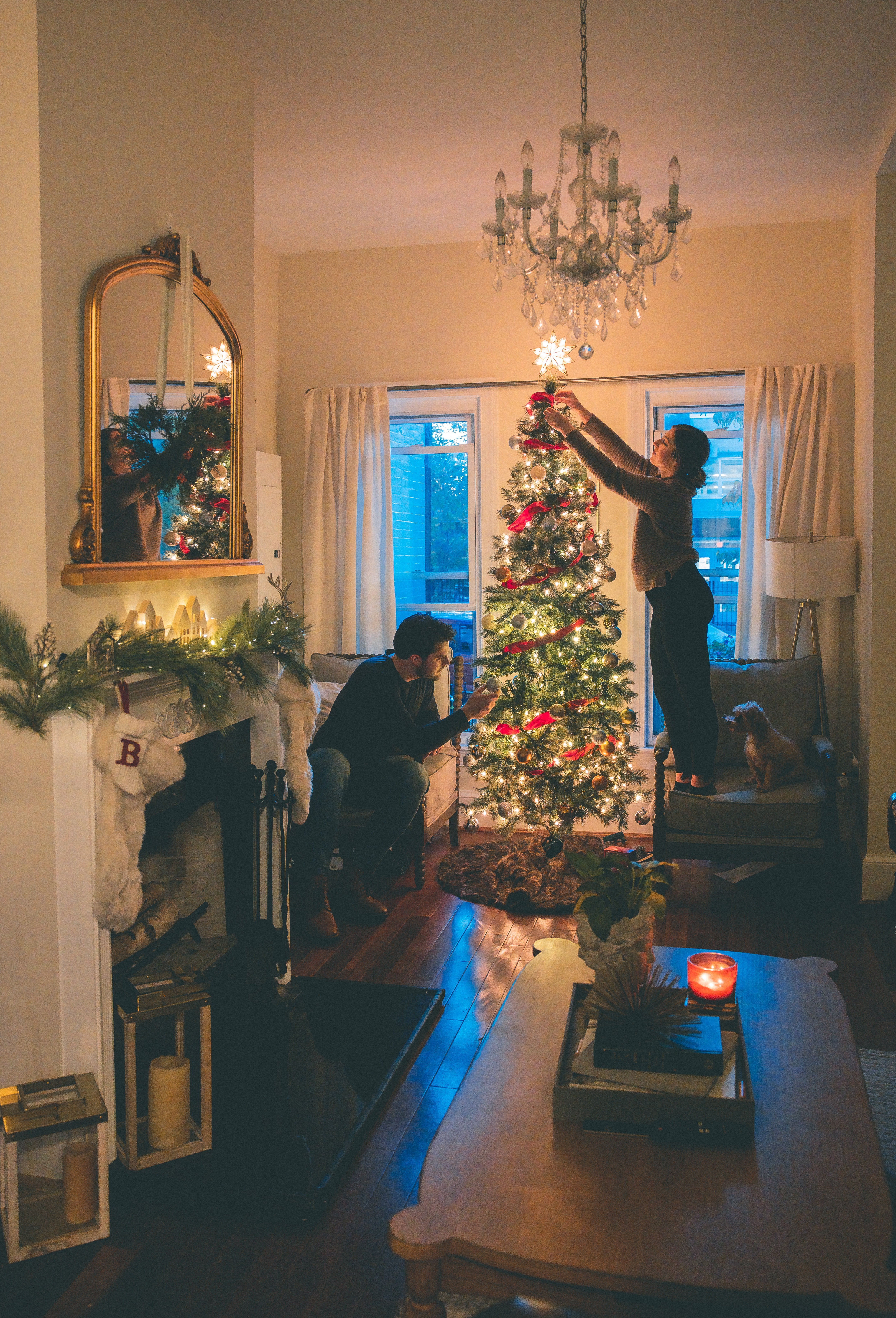 couple decorating Christmas tree by Caleb Fisher?width=698&height=466&fit=crop&auto=webp&dpr=4