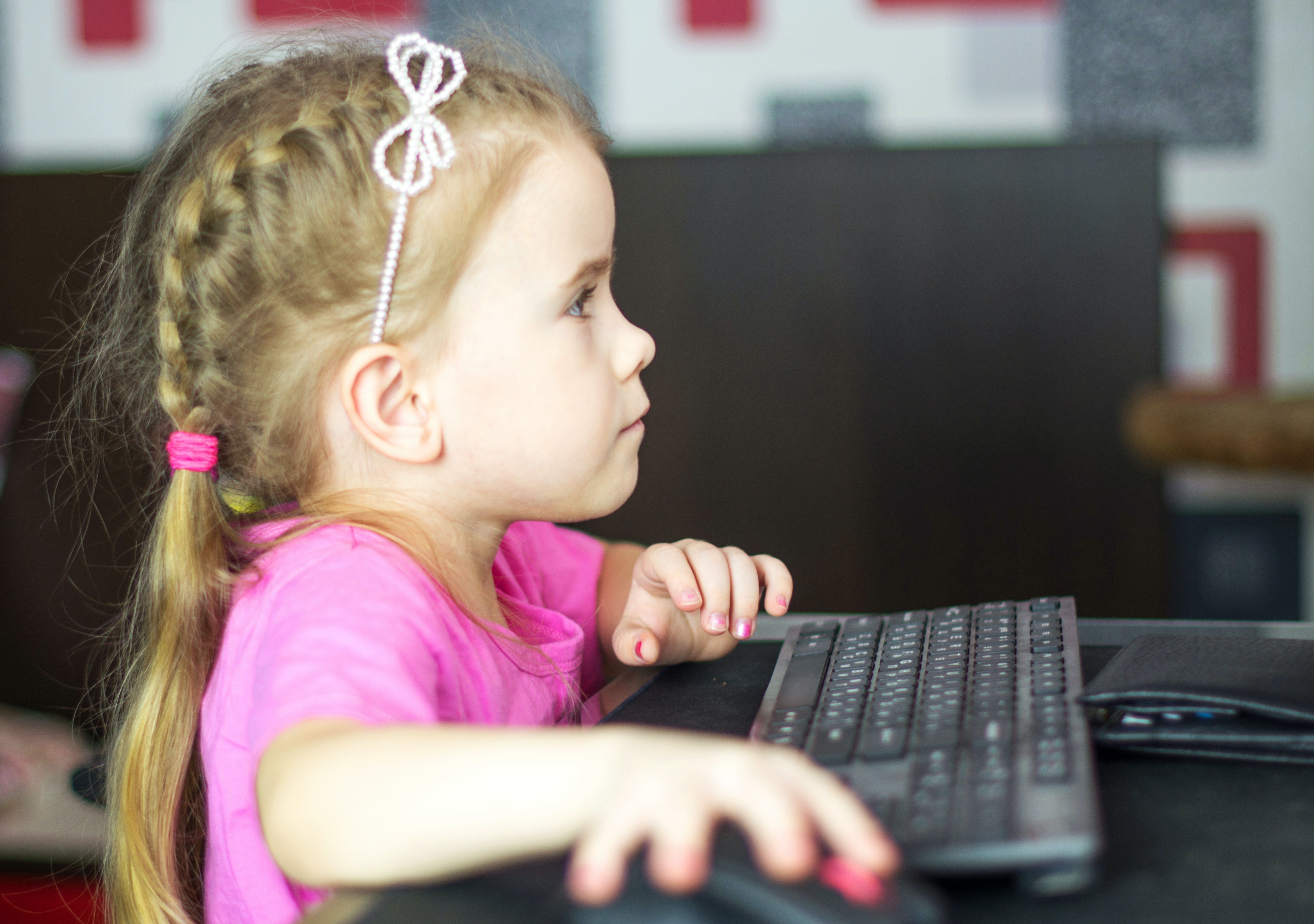 Little girl on computer