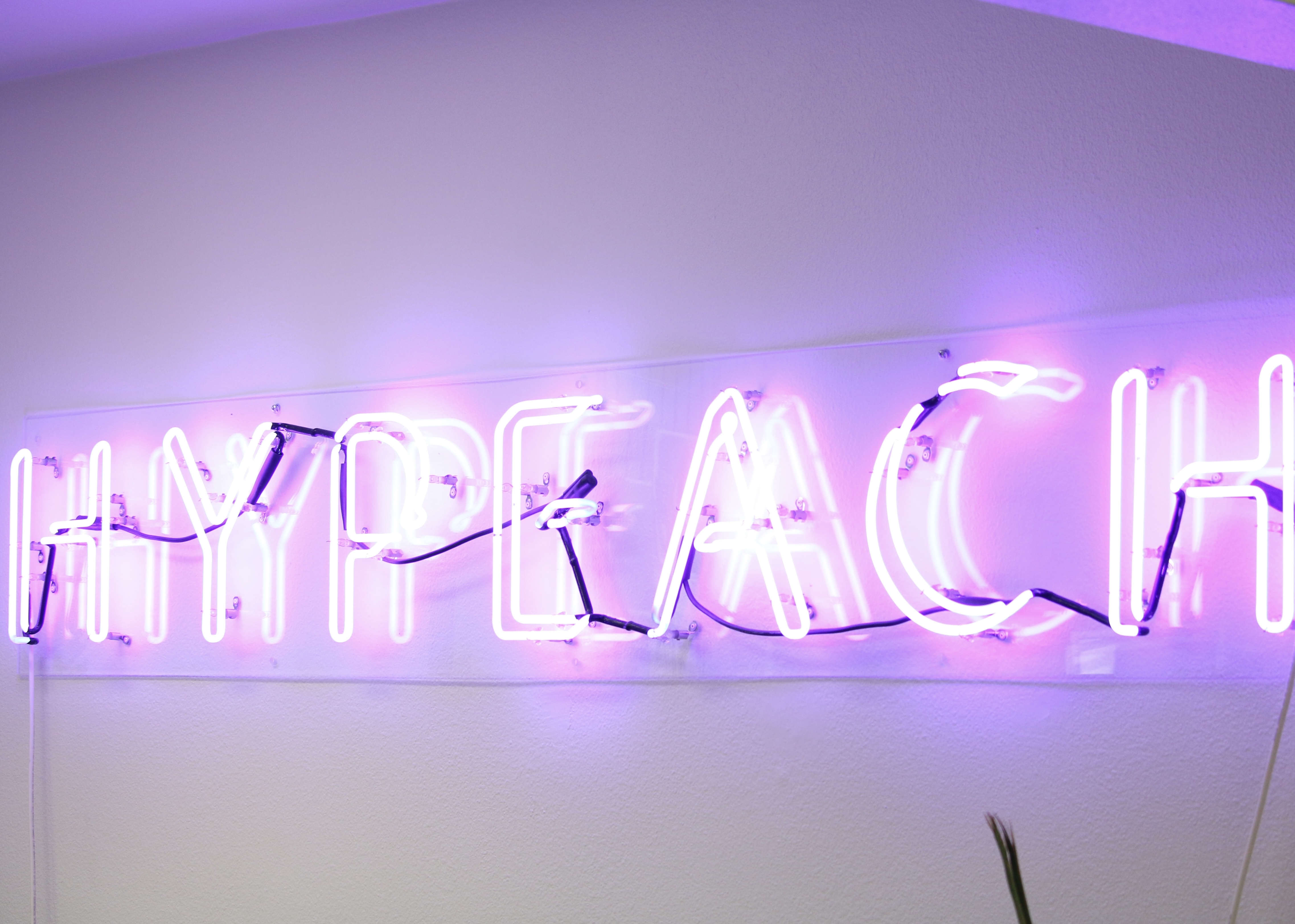 glowing sign stating HYPEACH