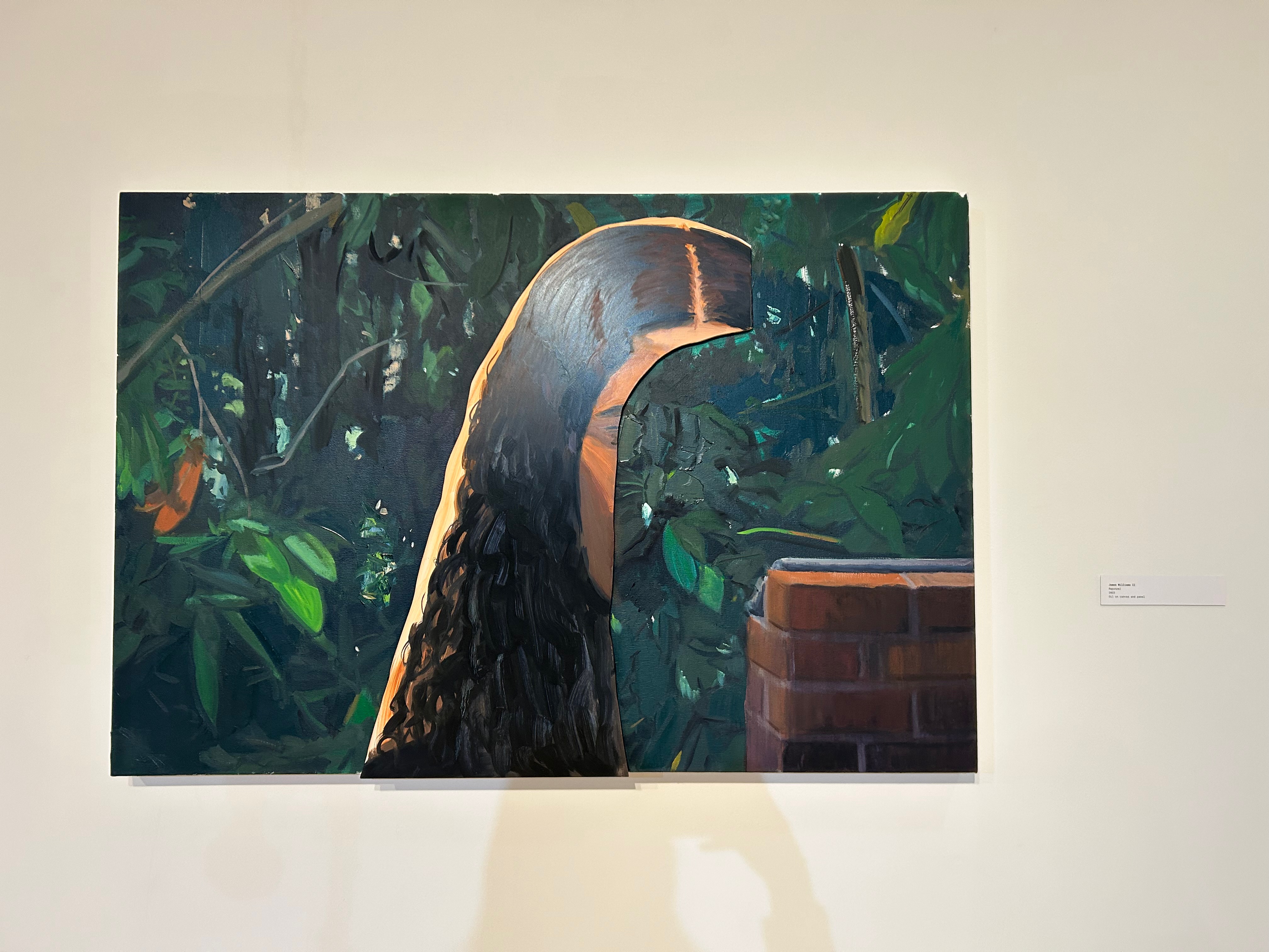 James Williams II showcases his painting, \"Rapunzel,\" at the new Stamp Gallery exhibition.