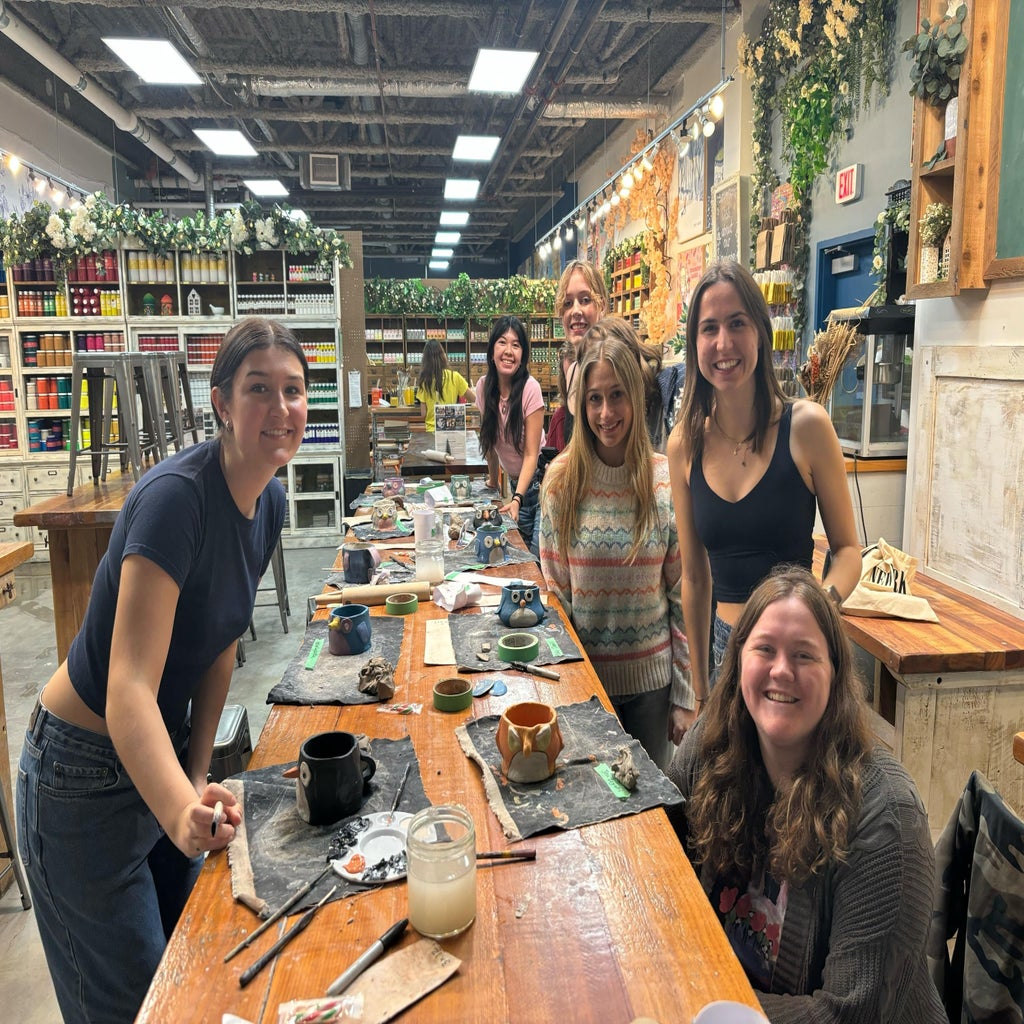 hc uvic members making clay in a pottery studio