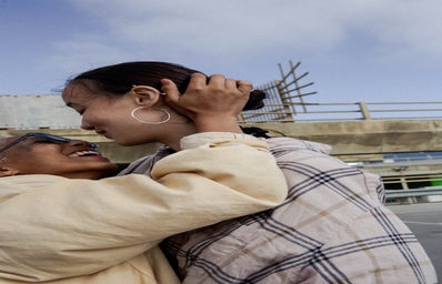 queer couple kissing shingi rice unsplash?width=398&height=256&fit=crop&auto=webp