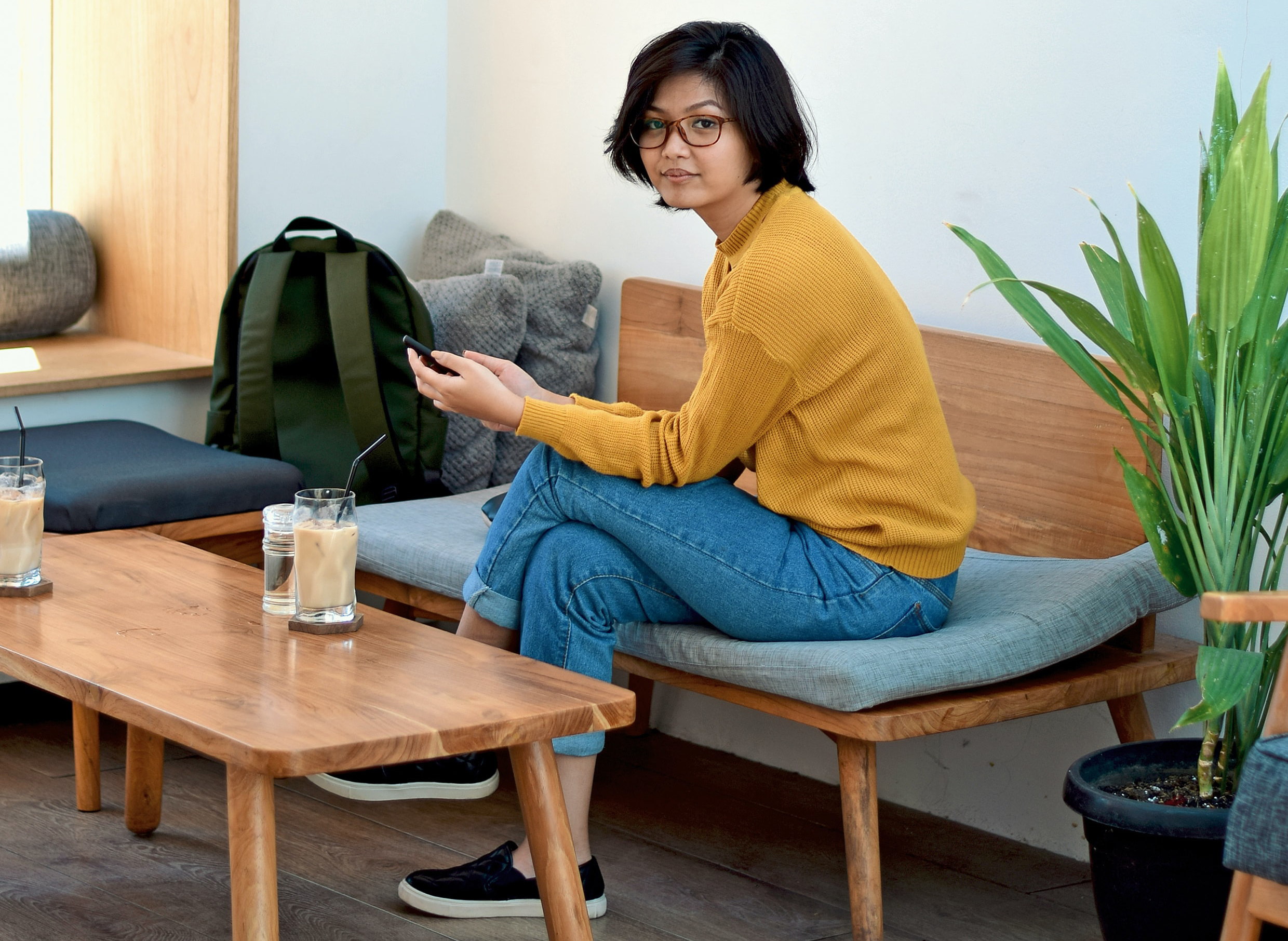 young woman in college dorm
