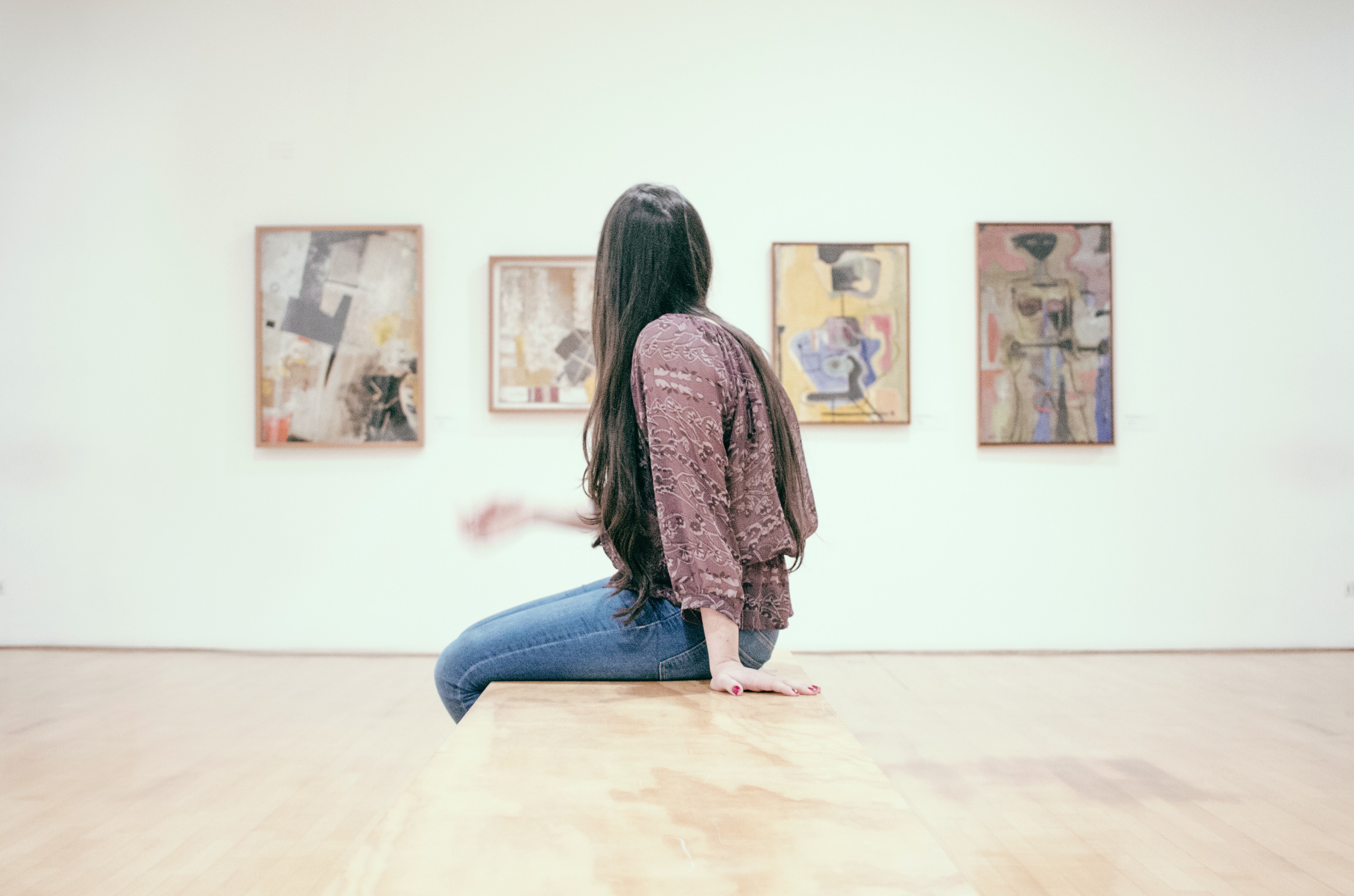 Woman at art museum by Gilber Franco via Unsplash?width=698&height=466&fit=crop&auto=webp&dpr=4