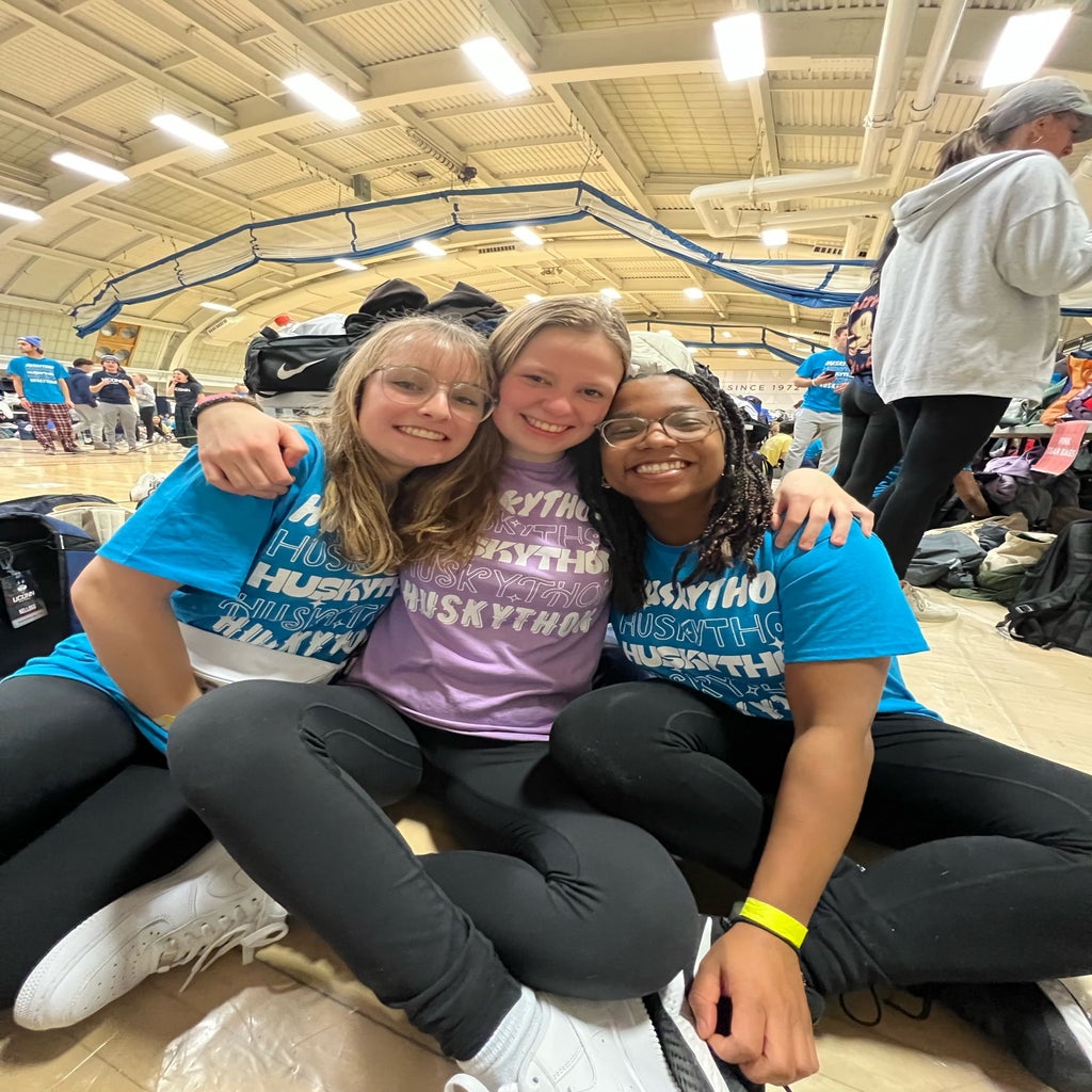 Three girls smiling