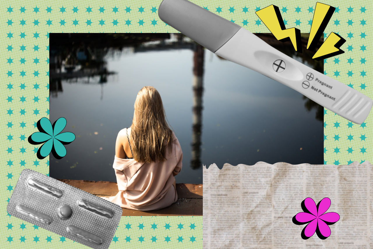 woman sitting by lake