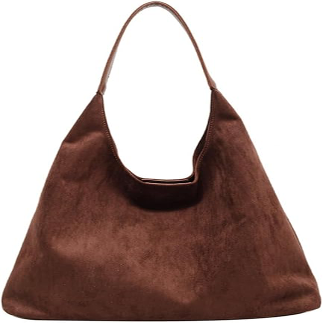 A suede bag on a white background