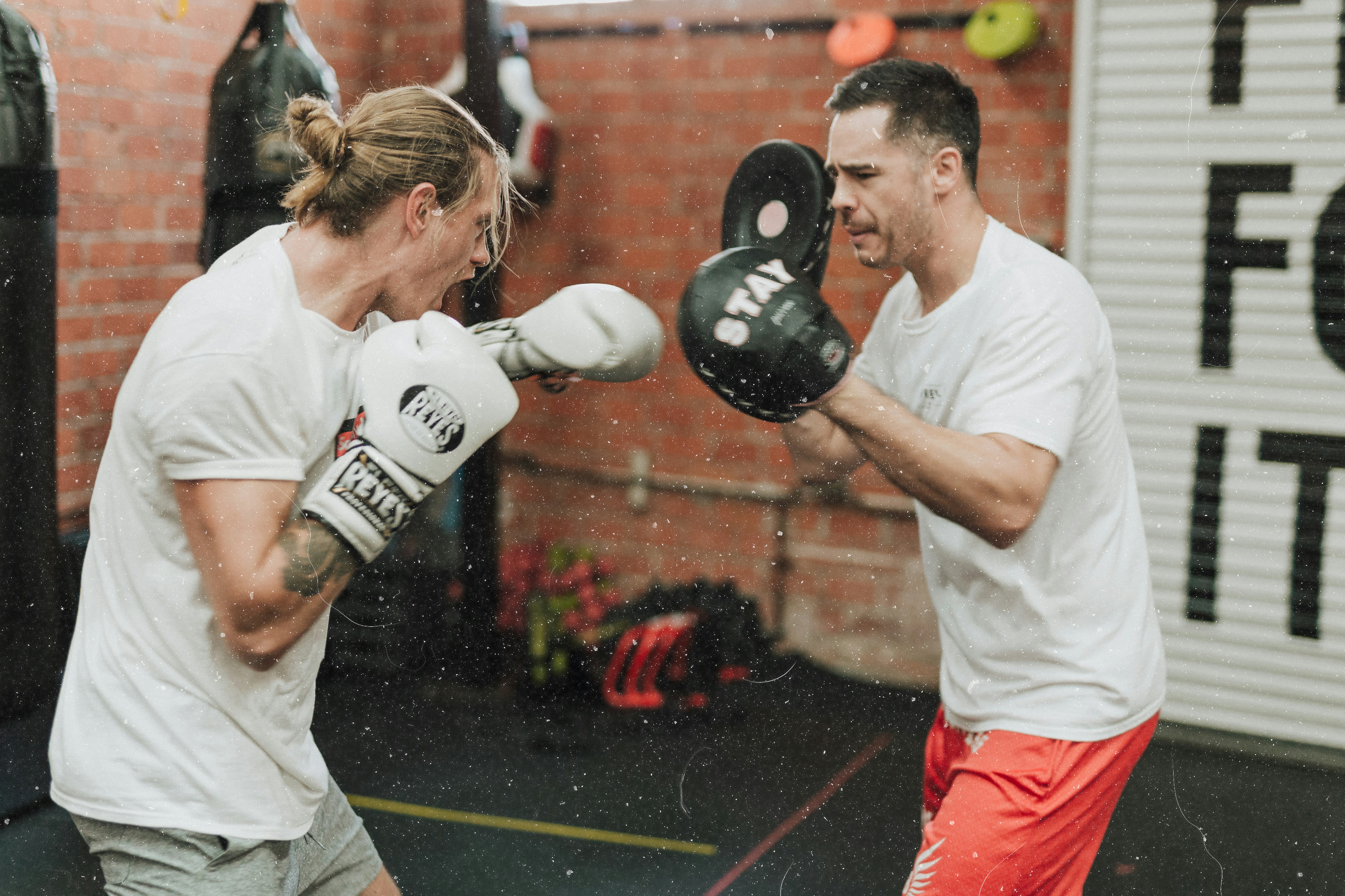 photo of two people boxing