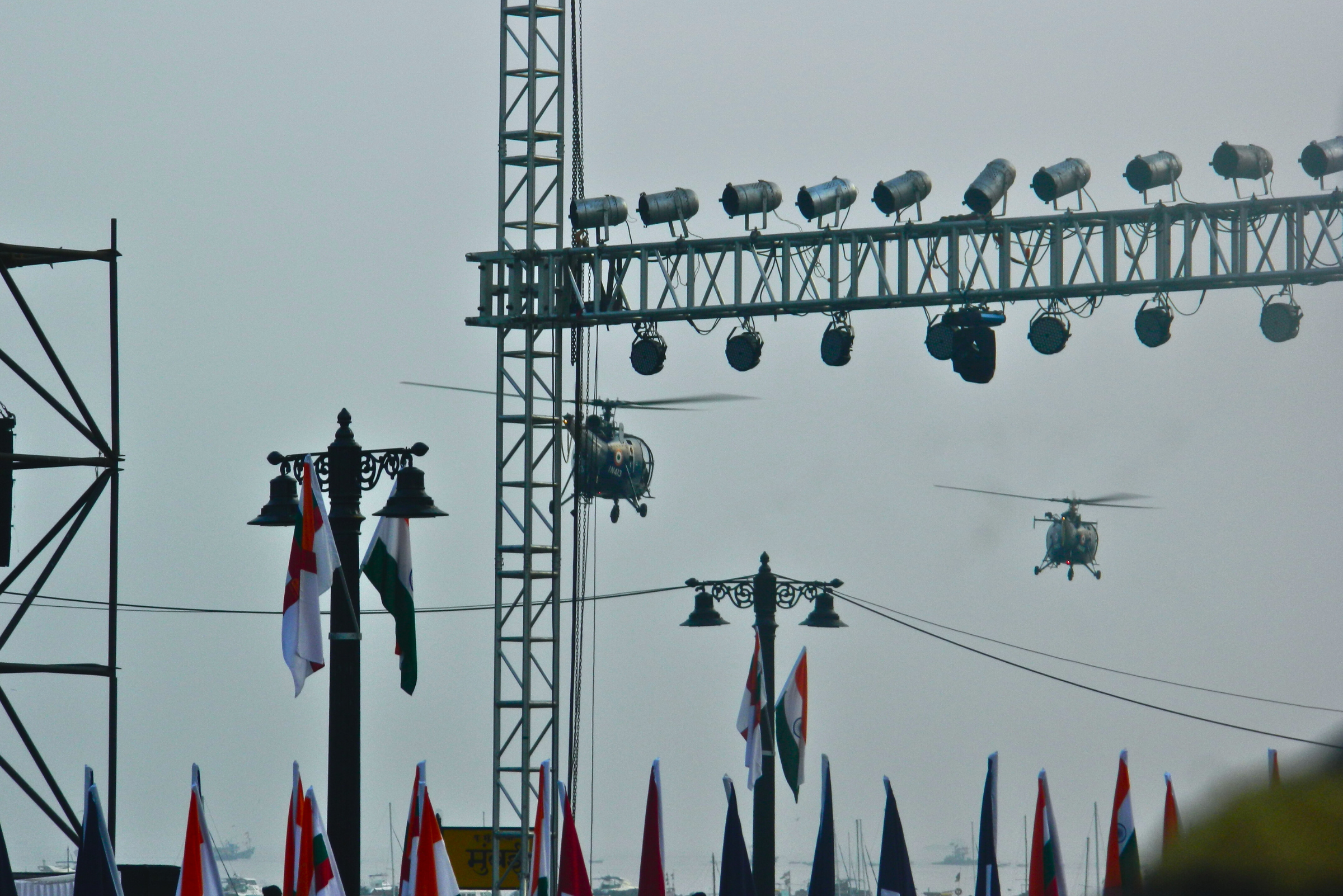 Helicopters flying as a display on Indian Navy Day.