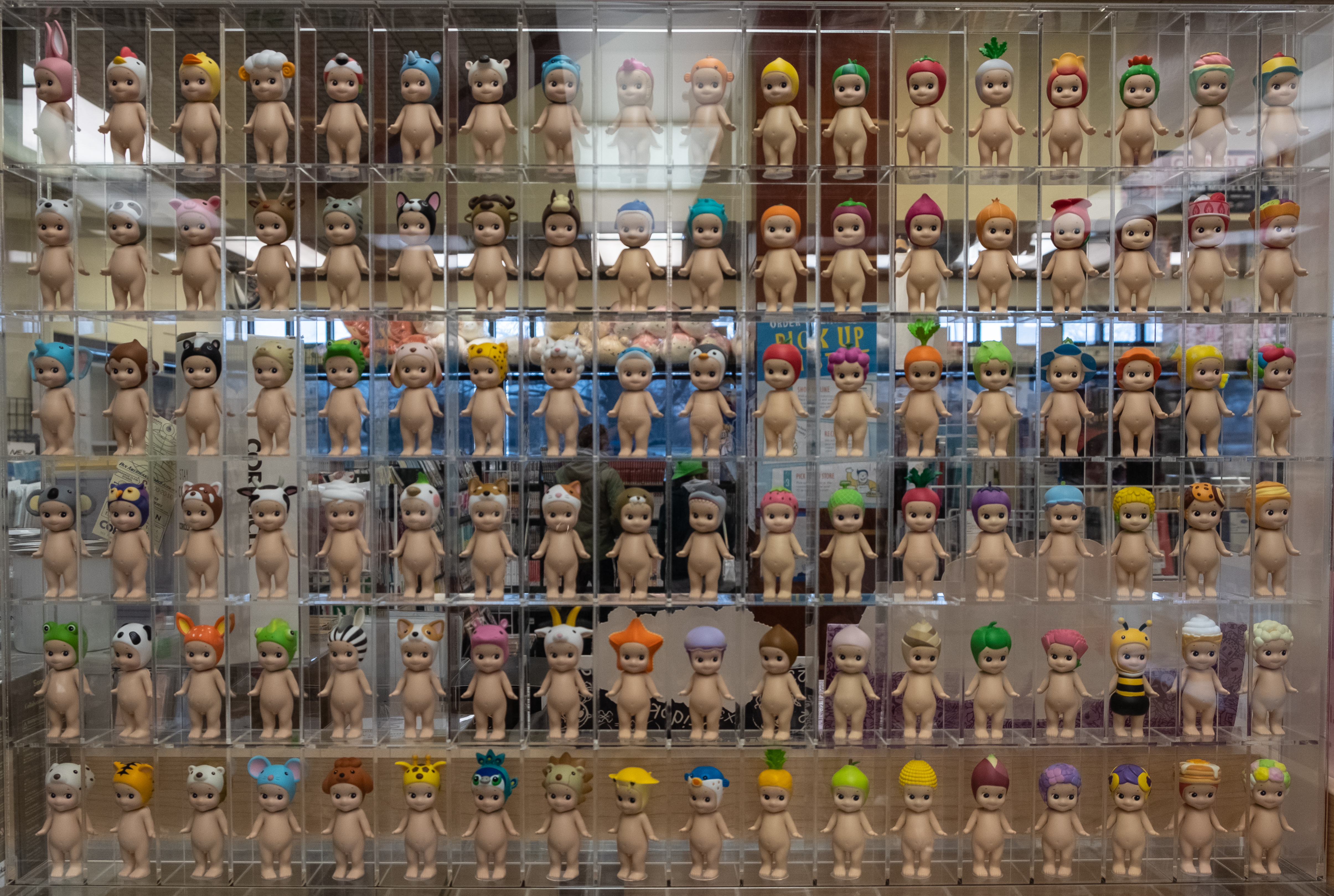 A collection of Sonny Angels inside a display case