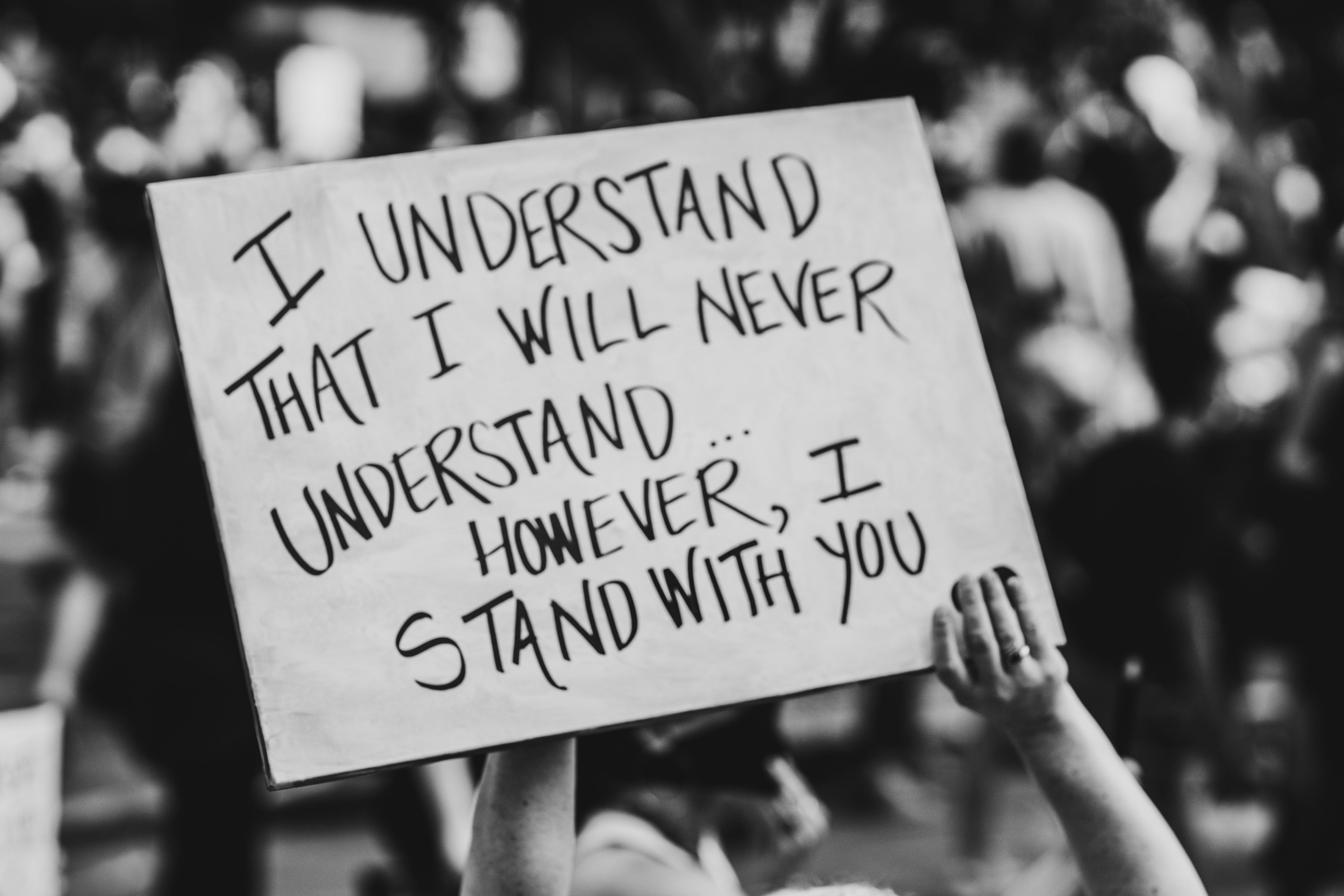i stand with you protest sign by Zoe VandeWater via Unsplash?width=698&height=466&fit=crop&auto=webp&dpr=4
