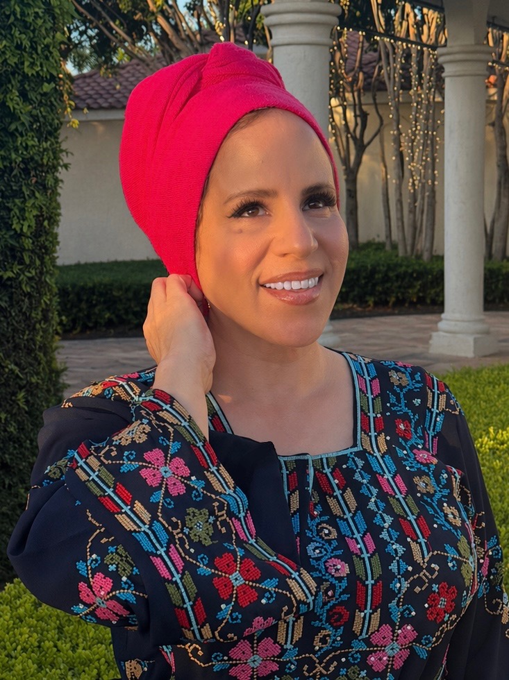 Rida Hamida pictured with her iconic pink hijab.