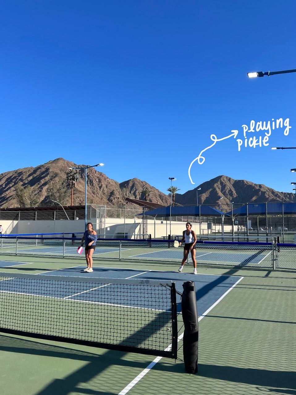 pickleball court showing two girls playing