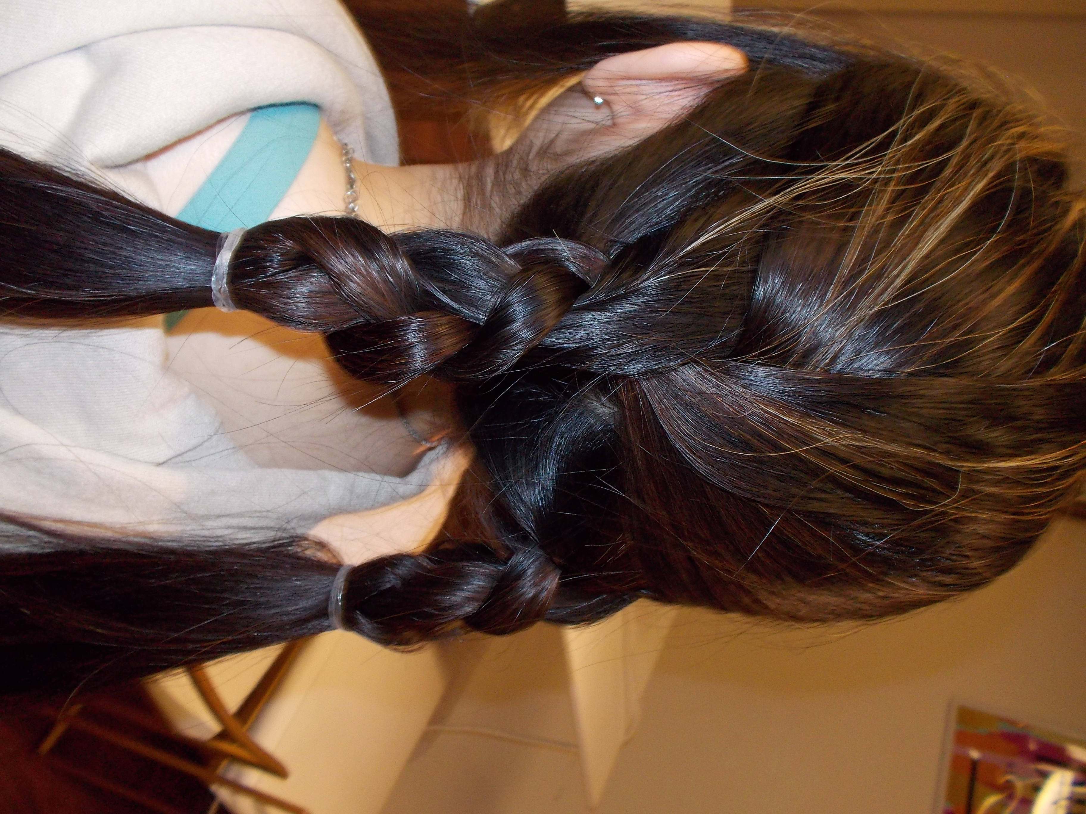 back of womans head showcasing hairstyle