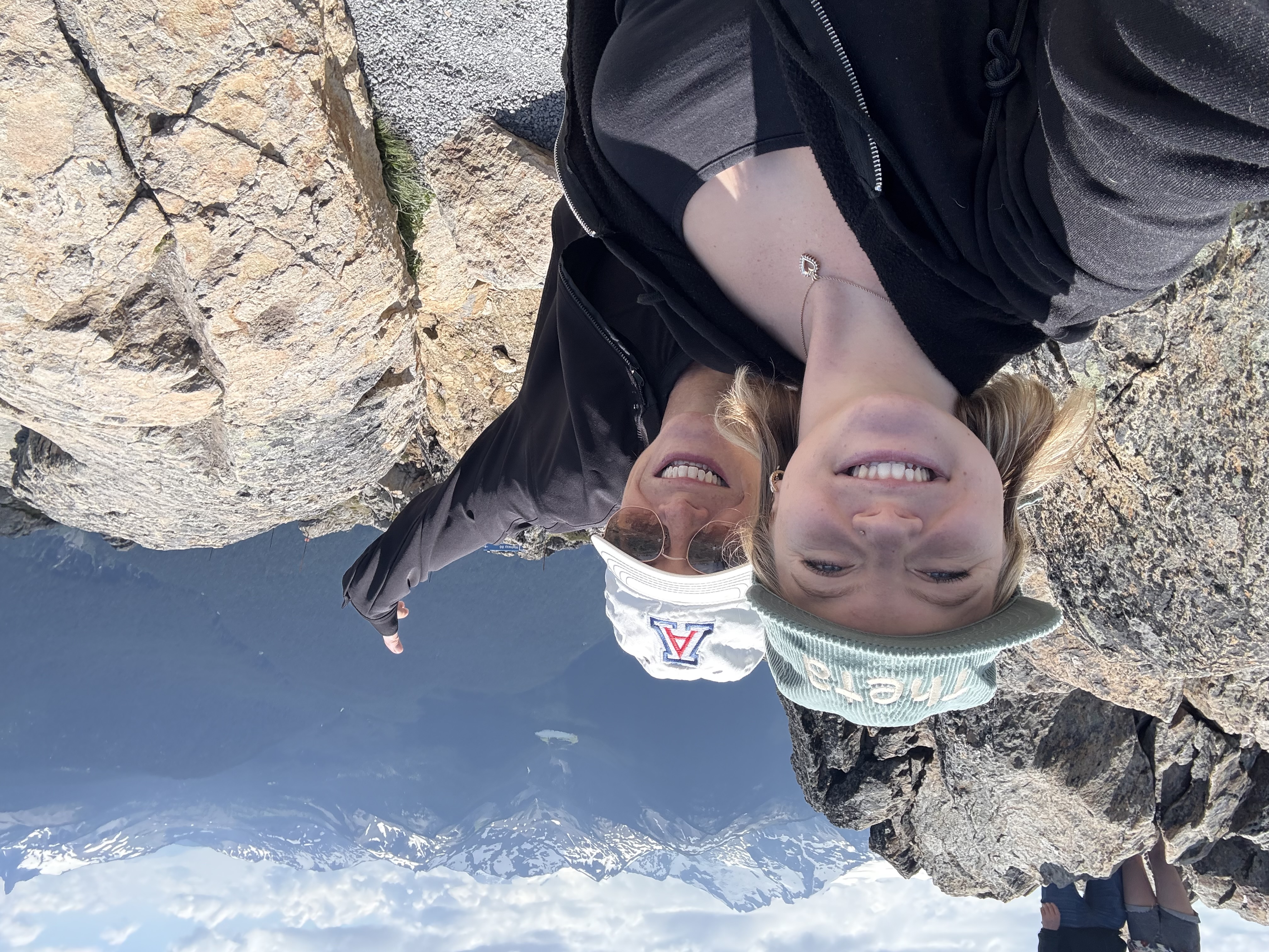 Two women taking a selfie outside