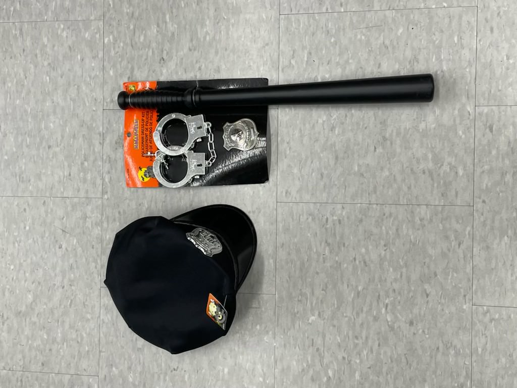 police baton, police hat and police handcuffs