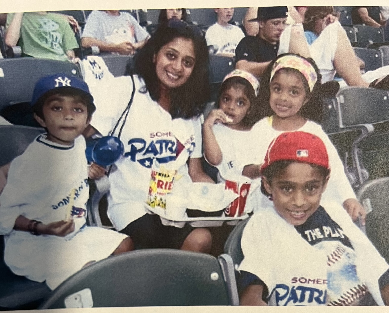 A photo of my mom and me and my siblings