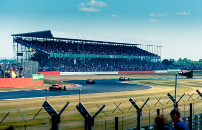 Formula 1 cars racing at the Silverstrone circuit in the UK