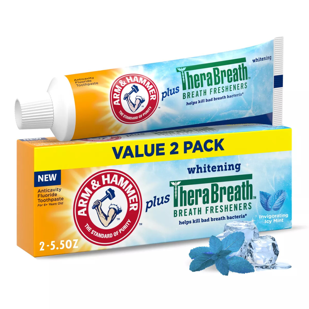 tube of toothpaste on top of a value 2-pack box with an ice cube and mint leaf in front