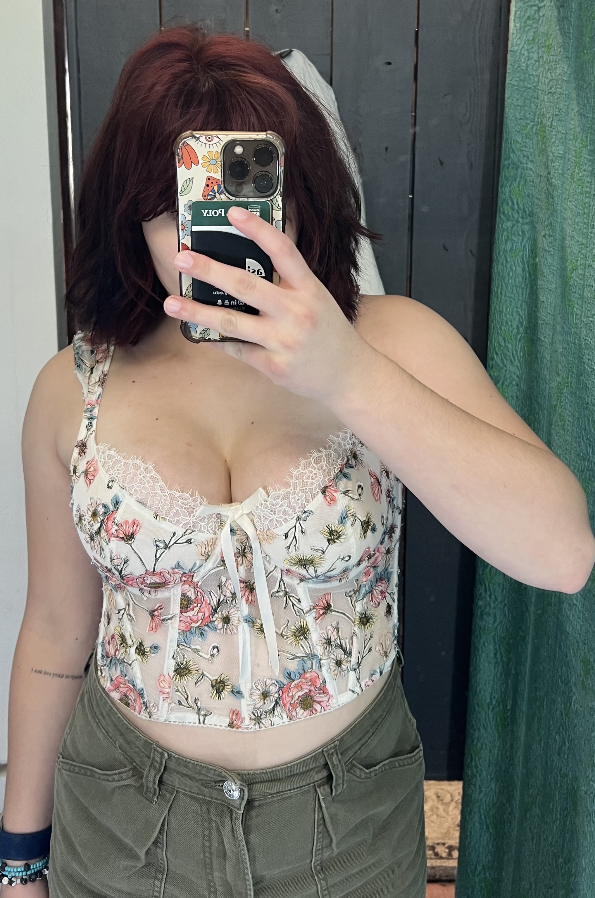 Me wearing a white corset top