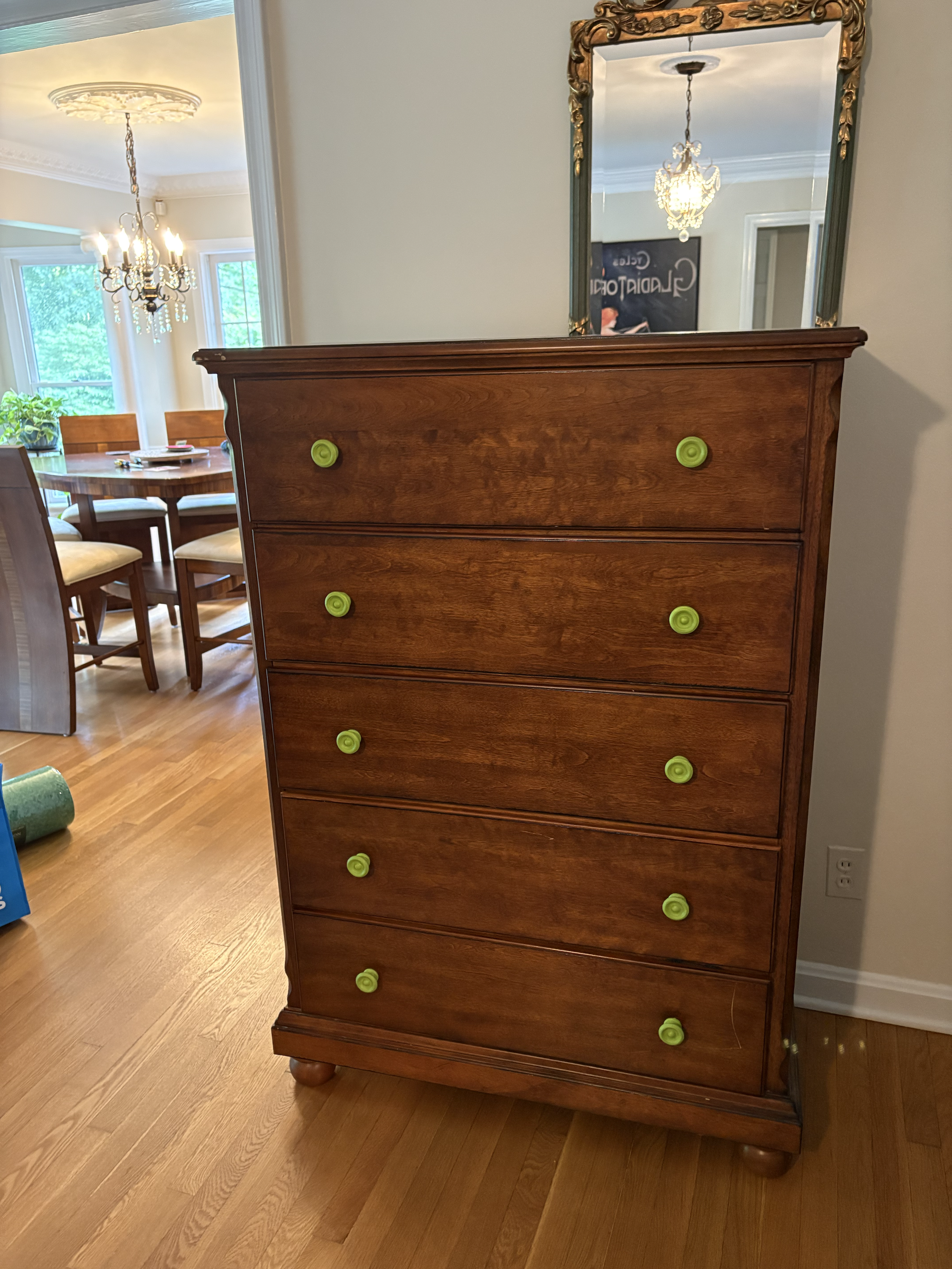 Dresser with green knobs