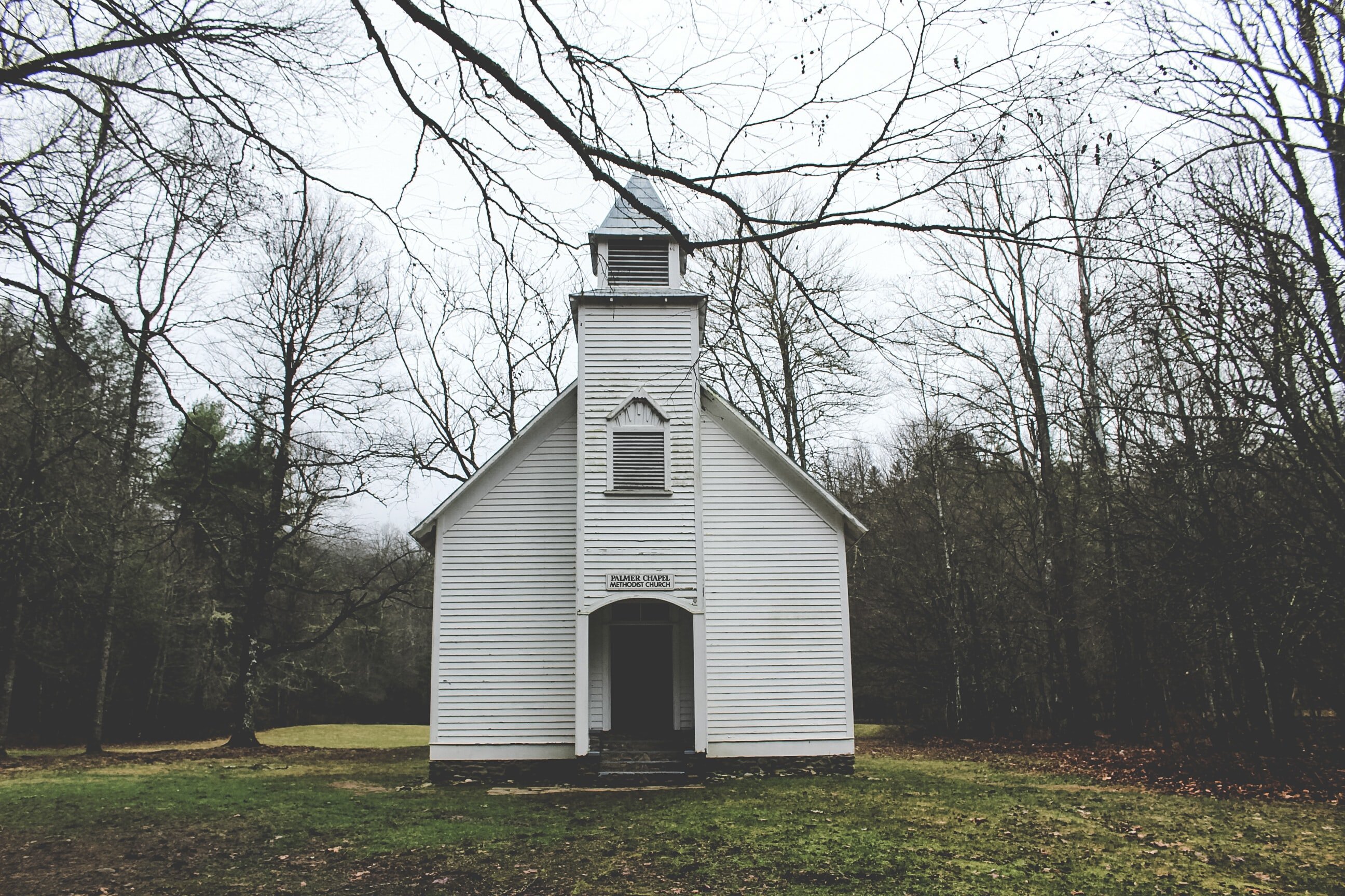 Small white chapel in woods by Harry Miller?width=698&height=466&fit=crop&auto=webp&dpr=4