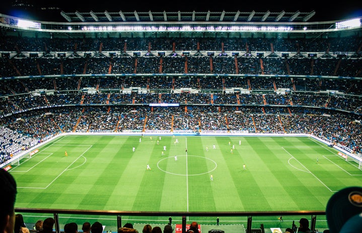 soccer stadium with game going on